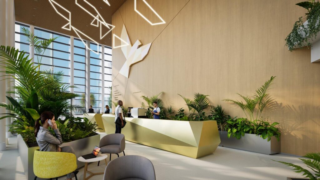 Modern reception area of De Entree with geometric design elements, natural lighting, and lush indoor plants.